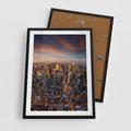 Plakat w ramie 50x70 - Miasto wieżowców w perspektywie - miasto, wieżowce - rama czarna