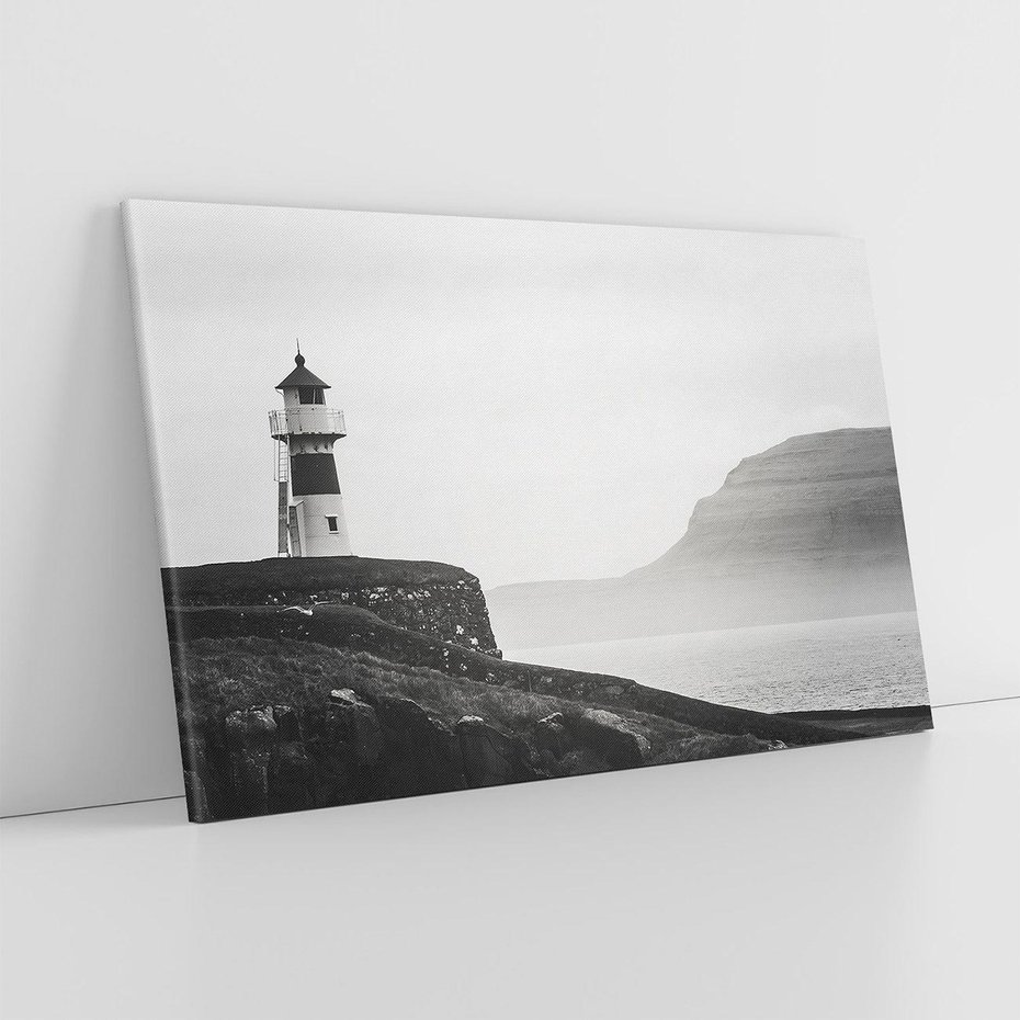 Obraz na płótnie 70x50 - Wiszące na horyzoncie wspomnienia - latarnia morska, klif