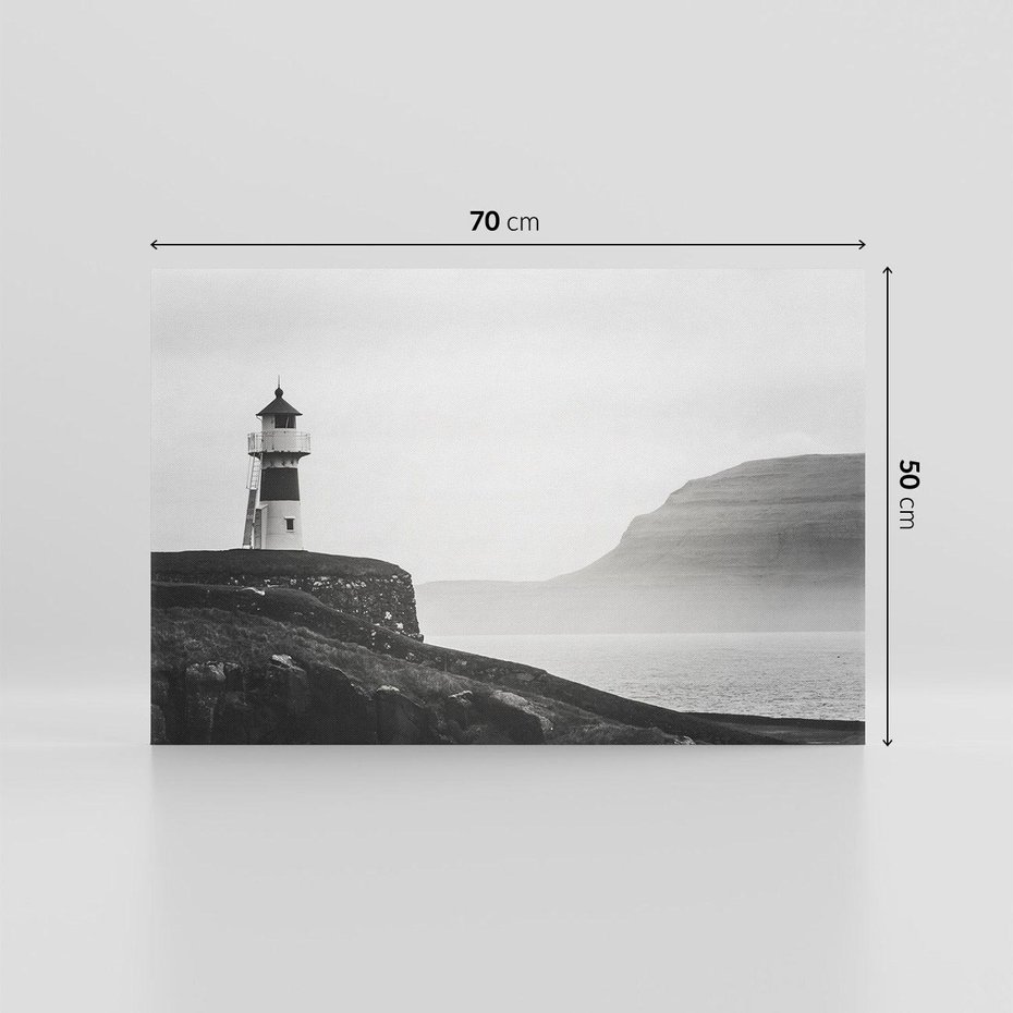 Obraz na płótnie 70x50 - Melancholia Północy - czarnobiała fotografia, nadmorska latarnia na klifie