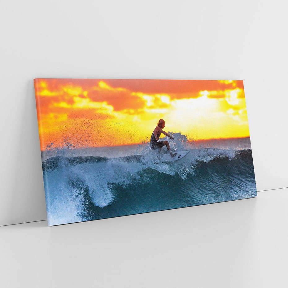 Obraz na płótnie 100x50 - Surfer na falach morza: Spotkanie z wolnością - surfer, surfing