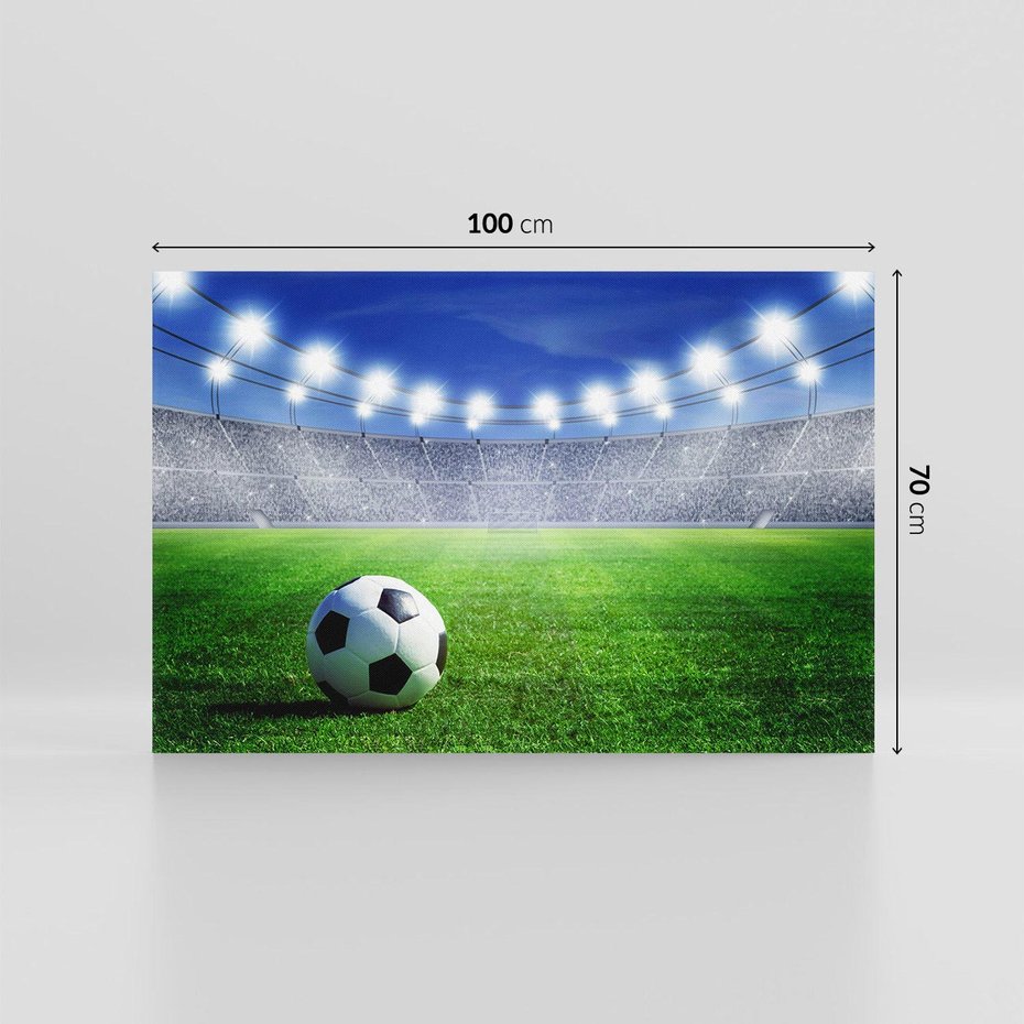 Obraz na płótnie 100x70 - Piłka nożna na stadionie: duch sportu - piłka nożna, stadion