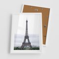 Plakat w ramie 50x70 - Eiffla w mglistym świetle - Eiffla, Paryż - rama biała