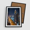 Plakat w ramie 50x70 - Nocna magia - miasto, noc - rama czarna
