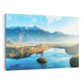 Obraz na płótnie 70x50 - Zamek pośrodku jeziora - jezioro, góry