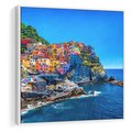 Obraz w ramie 80x80 - Barwne Wybrzeże - nadmorskie miasto na klifie, kolorowe tęczowe budynki - rama biała