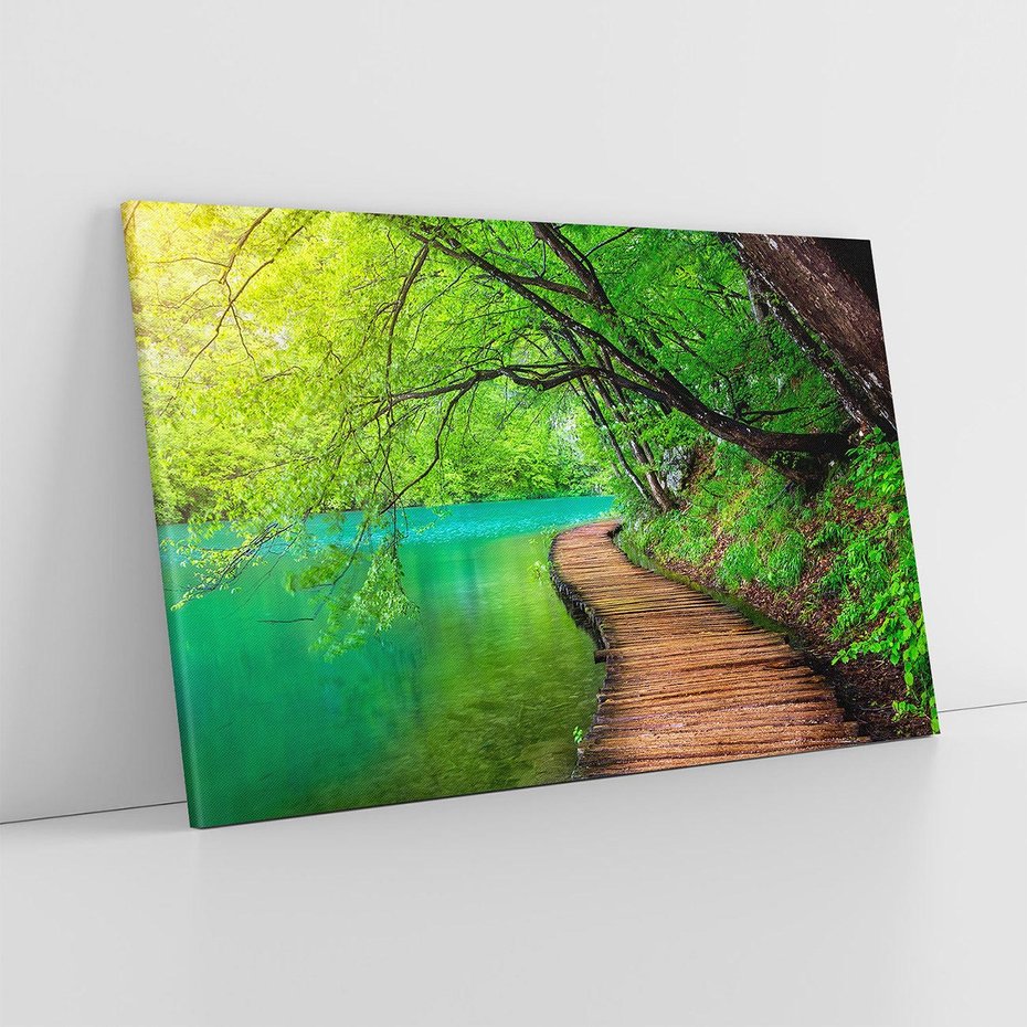 Obraz na płótnie 100x70 - Spokój nad jeziorem: Zatop się w naturze - jezioro, drzewa