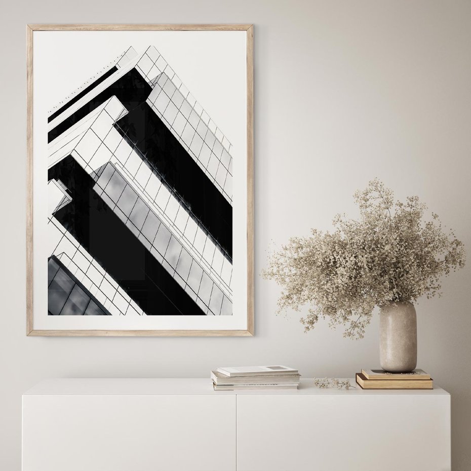 Plakat w ramie 30x40 - Nowoczesna Surowość: Wieżowiec na Czarno-Białej Grafice - architektura, wieżowiec - rama drewno