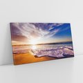 Obraz na płótnie 140x70 - Zachód słońca na plaży: Magia nad morzem - morze, plaża