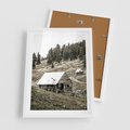 Plakat w ramie 50x70 - Ustronne Chatki w Górach - rustykalne domki w górach, sepia - rama biała