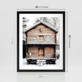 Plakat w ramie 40x50 - Śnieżny Ustronny Raj - domek w górach, śnieg - rama czarna
