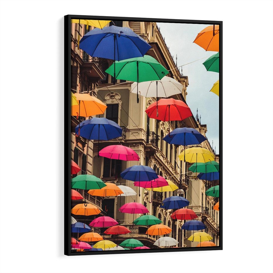 Obraz w ramie 50x70 - Barwna symfonia wyobraźni - fotografia, kolorowe parasolki podwieszone nad ulicą - rama czarna