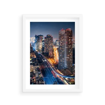 Plakat w ramie 40x50 - Miasto nocą z wieżowcami w tle - miasto, nocą - rama biała