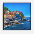Obraz w ramie 50x50 - Barwne Wybrzeże - nadmorskie miasto na klifie, kolorowe tęczowe budynki - rama czarna