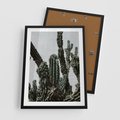 Plakat w ramie 50x70 - Boho oaza wśród kaktusów - kaktusy, pustynia - rama czarna