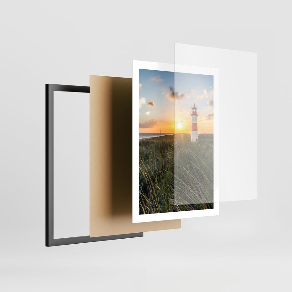 Plakat w ramie 50x70 - Magia latarni przy zachodzie - latarnia, zachód - rama czarna