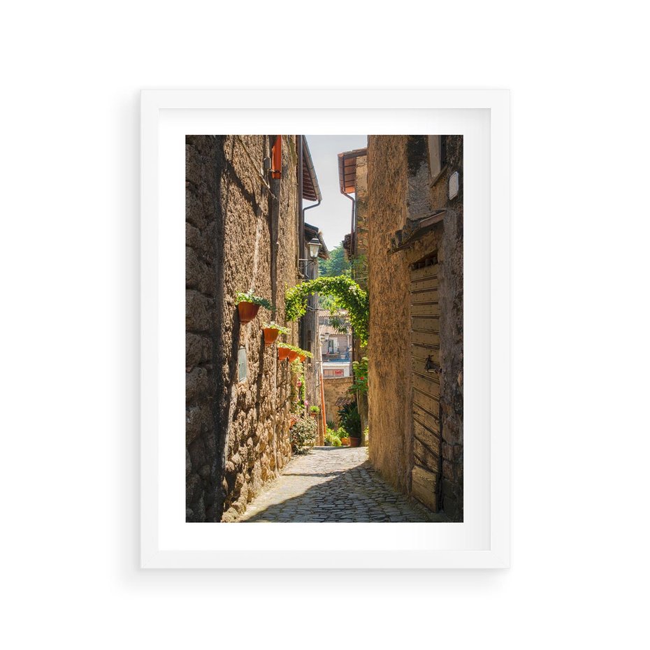 Plakat w ramie 30x40 - Włoska uliczka w perspektywie - Włochy, uliczka - rama biała