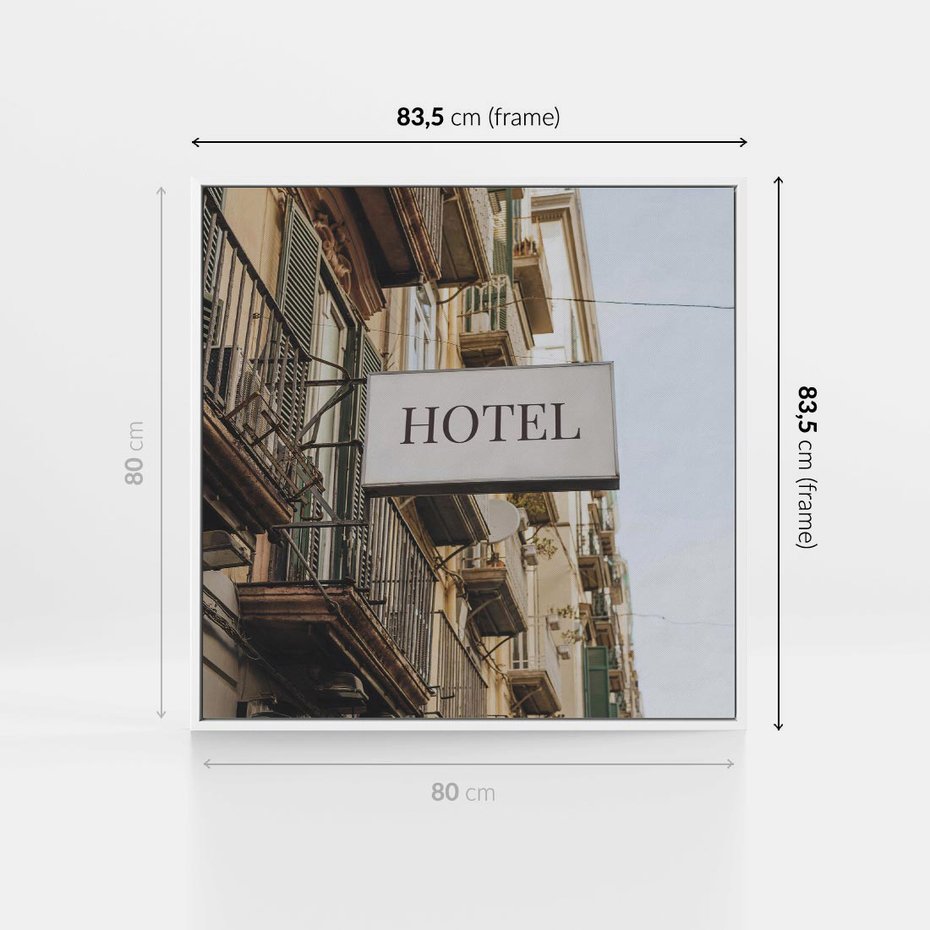 Obraz w ramie 80x80 - Magiczne Spacery - hotel, uliczka - rama biała