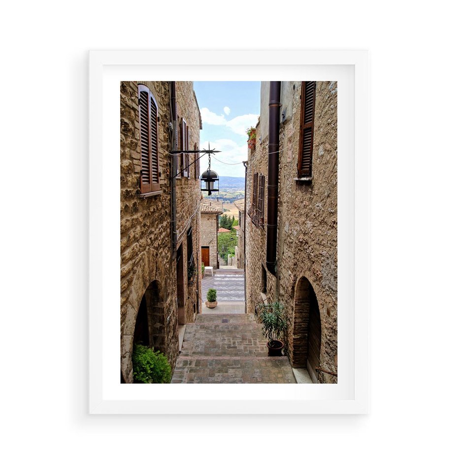 Plakat w ramie 50x70 - Perspektywa malowniczej uliczki - uliczka, perspektywa - rama biała