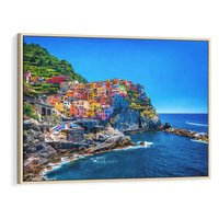 Obraz w ramie 120x80 - Barwne Wybrzeże - nadmorskie miasto na klifie, kolorowe tęczowe budynki - rama drewno