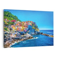 Obraz na płótnie 70x50 - Barwne Wybrzeże - nadmorskie miasto na klifie, kolorowe tęczowe budynki