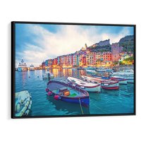 Obraz w ramie 70x50 - Tańczące kolory zachodu - nadmorskie kolorowe miast, kolorowe budynki na brzegu - rama czarna