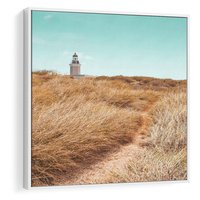 Obraz w ramie 50x50 - Tajemnicza Ścieżka - latarnia morska w oddali, suche trawy - rama biała