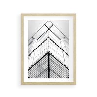 Plakat w ramie 50x70 - Elegancja Współczesnej Architektury: Wieżowiec w Monochromii - nowoczesna architektura, czarno biała fotografia - rama drewno