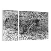 Obraz na płótnie 120x80 - Zapomniany Urok - czarno biała fotografia, stary rower oparty o mur