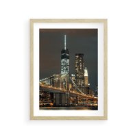 Plakat w ramie 50x70 - Miasto rozświetlone nocnym blaskiem - miasto, nocą - rama drewno
