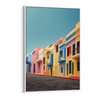 Obraz w ramie 50x70 - Ekspresja marzeń i tęsknot - pastelowe kolorowe budynki, wzdłuż ulicy - rama biała