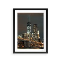 Plakat w ramie 30x40 - Miasto rozświetlone nocnym blaskiem - miasto, nocą - rama czarna
