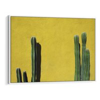 Obraz w ramie 100x70 - Refleksje w roślinnym odbiciu - zielone kaktusy na tle żółtej ściany, soczyste kolory - rama biała