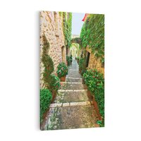 Obraz na płótnie 70x100 - Magiczna podróż w głąb miasta - uliczka, perspektywa